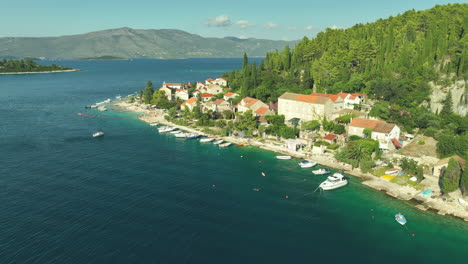 High-angle-drone-panning-shot-of-Korcula-in-Croatia-on-a-sunny-day