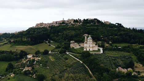 Drone-shot-of-Italy's-important-Sanctuary-of-the-Madonna-amidst-the-rural-countryside