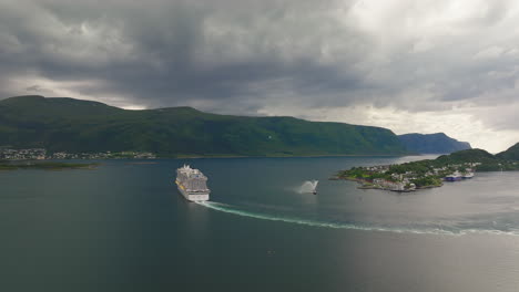 Passengers-on-vacation-in-tranquil-Norwegian-Sea,-cruise-liner-AidaNova