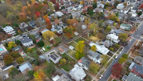 Residential-neighborhood-in-small-American-town-with-colorful-autumn-trees-and-streets