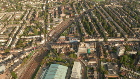 Pan-down-aerial-shot-over-Kentish-town-high-street-London