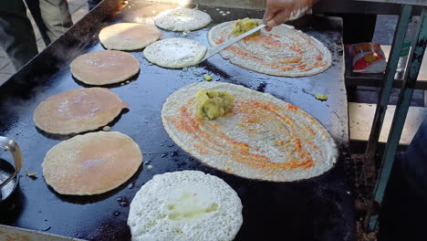 Indian-breakfast-crepes-made-of-lentils-and-rice-Dosa,-close-up