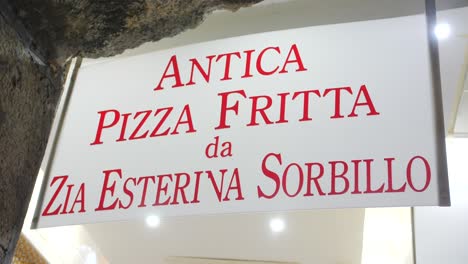 Antica-Pizza-Fritta-da-Zia-Esterina-Sorbillo-Signage---Famous-Fried-Pizza-In-Naples,-Italy