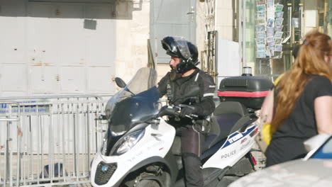 Israeli-Police-Riding-A-Three-wheel-Motorbike-Patrolling-In-The-Streets-Of-Jerusalem,-Israel