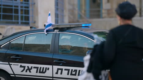 Israel-Police-Patrol-Car-In-The-Street-In-Jerusalem,-Israel