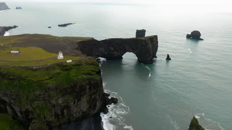 Dyrhólaey-Viewpoint-With-Cliffside-Lighthouse-In-Vik,-Southern-Iceland