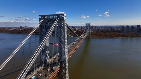 An-aerial-view-of-the-George-Washington-Bridge-from-over-Fort-Lee,-New-Jersey-on-a-bright-and-sunny-day-in-autumn