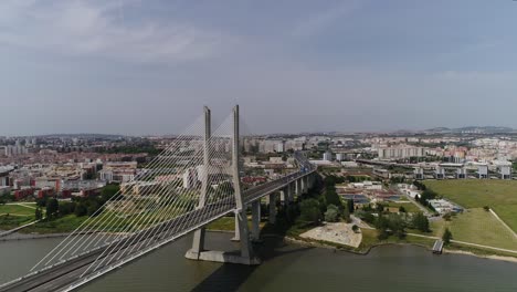 Ponte-Vasco-da-Gama,-Lisbon,-Portugal-4k-Aerial-View