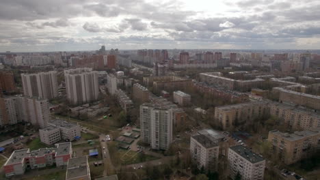 Panoramic-aerial-view-of-one-of-the-districts-of-Moscow-cloudy-weather-Urban-cityscape-from-quadrocopter
