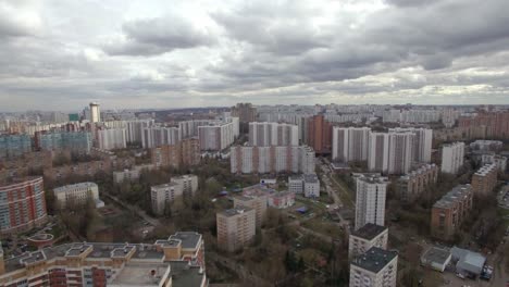 Aerial-view-of-one-of-the-districts-of-Moscow-cloudy-weather-Urban-cityscape-from-quadrocopter