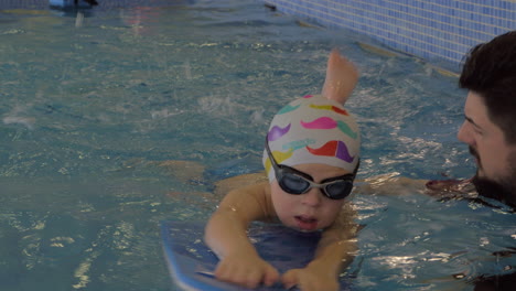 Rehabilitation-Centre-Evexia-swimming-lesson-small-boy-and-teacher-in-swimming-pool