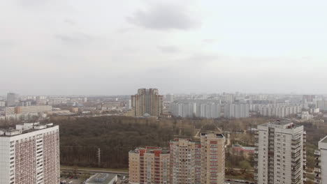 Aerial-view-of-one-of-the-districts-of-Moscow-cloudy-and-foggy-weather-Urban-cityscape-from-quadrocopter