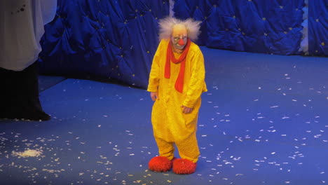 On-snow-show-of-Slava-Polunin-acts-the-clown-in-a-yellow-suit