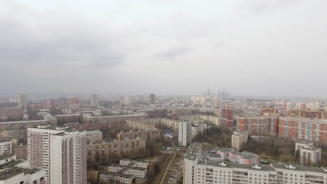Aerial-view-of-one-of-the-districts-of-Moscow-Moscow-state-University-and-Moscow-city-in-the-distance-Urban-cityscape
