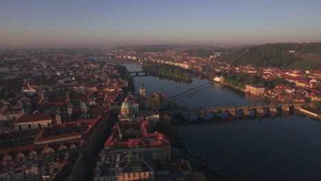 Aerial-view-of-the-old-part-of-Prague-and-bridges-over-the-Vltava-river-at-sunrise-Charles-bridge-Urban-landscape