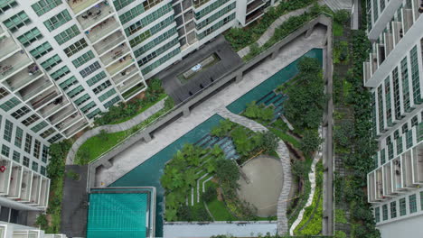 Timelapse-aerial-shot-of-landscape-area-outside-apartment-blocks