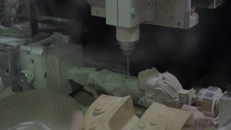 View-of-mechanism-in-process-making-3d-sculpture-with-stone