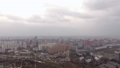 Panoramic-aerial-view-of-one-of-the-districts-of-Moscow-with-road-traffic-cloudy-weather-Urban-cityscape