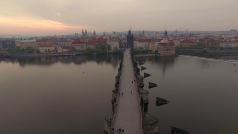 Ancient-Charles-Bridge-and-Prague-view-aerial-shot