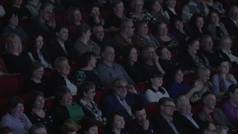 A-lot-of-people-in-the-movie-theater-watch-film-and-laugh