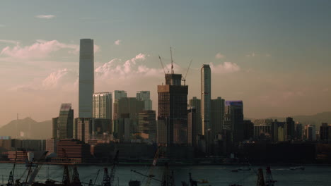 Timelapse-of-day-and-night-in-Hong-Kong-waterside-view