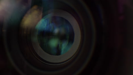 Macro-shot-of-the-iris-of-a-cinema-lens-opening-and-closing