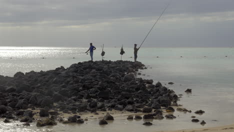 Two-men-fishing-on-the-coast