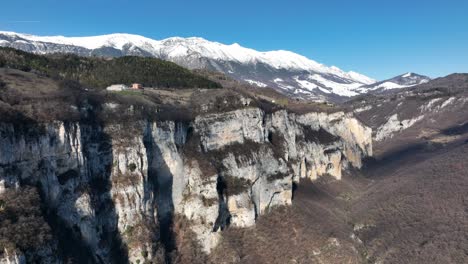 Monte-Baldo-Chain-with-Snow---Drone-Bottom-Up-Reveal-Shot---Spiazzi---Verona---Ungraded