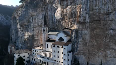 Madonna-della-Corona-Sanctuary---Drone-Shot-from-Side-back-flying-over-rooftop---Iconic-view-of-the-most-famous-church-in-the-world---Madonna-della-Corona---Spiazzi---Verona---Ungraded