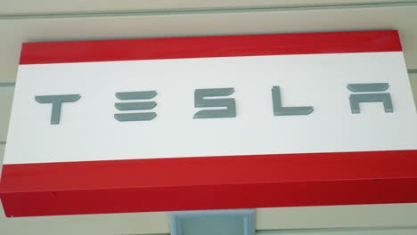 Tesla-banner-in-the-store-Automaker-of-electric-cars