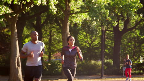 Young-black-couple-jogging-in-Brooklyn-park