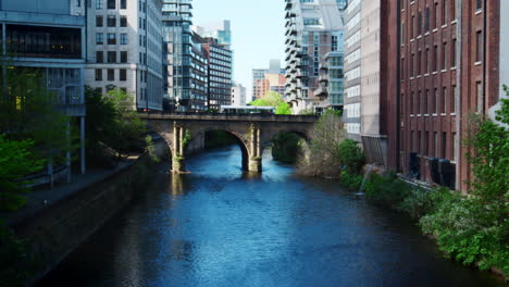 Manchester,UK---4-May-2017:-River-Irwell-Running-Through-Manchester-City-Centre