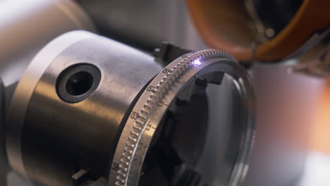 Laser-Engraving-Machine-Cutting-Numbers-on-Metal-Cinema-Lens-Workpiece