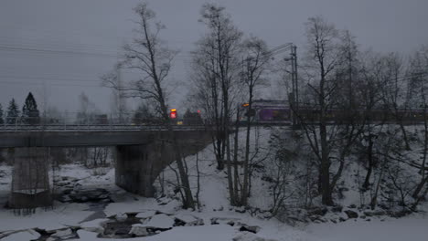 Commuter-train-crossing-the-bridge-in-Helsinki-Winter-scene