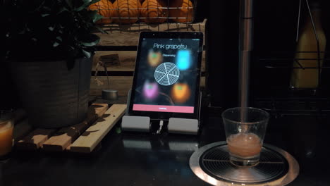 Drink-order-using-digital-menu-on-touch-pad-in-cafe