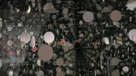 Visitor-taking-video-inside-cube-The-Passing-Winter-by-Yayoi-Kusama