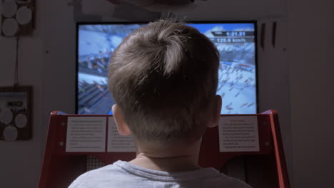Child-playing-racing-game-simulator
