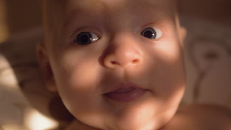 Indoor-portrait-of-smiling-baby-girl