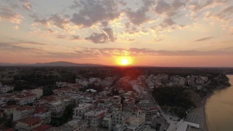 Aerial-panorama-of-resort-town-and-sea-at-sunrise-Nea-Kallikratia-Greece