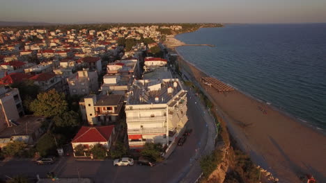 Aerial-morning-scene-of-small-resort-town-on-seashore-Greece