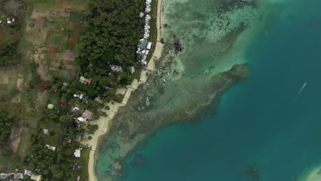 Aerial-bird-eye-view-of-coast-with-sand-beach-and-transparent-water-of-Indian-Ocean-Mauriticus-Island