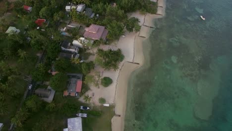 Aerial-bird-eye-view-of-coast-with-sand-beach-and-transparent-water-of-Indian-Ocean-Mauriticus-Island