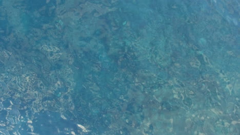 Aerial-view-of-clear-blue-water-in-lagoon