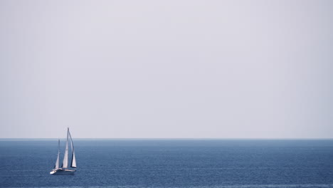 Scene-with-sky-sea-and-sailing-yacht