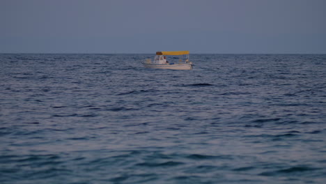 Boat-swinging-on-sea-waves