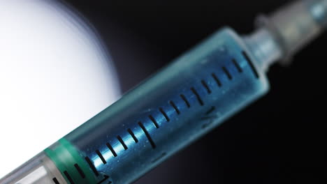 Handheld-close-up-of-syringe