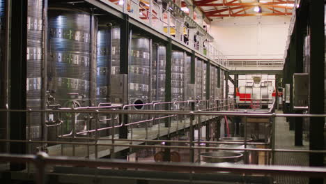 Metal-winemaking-equipment-in-a-modern-winemaking-facility