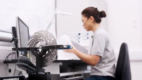 Female-Engineer-Uses-CMM-Coordinate-Measuring-Machine-In-Factory