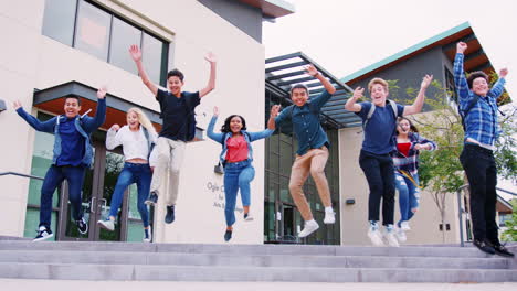 Group-Of-High-School-Students-Jumping-In-Air-Outside-College-Buildings