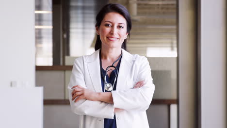 Hispanic-female-doctor-wearing-a-lab-coat